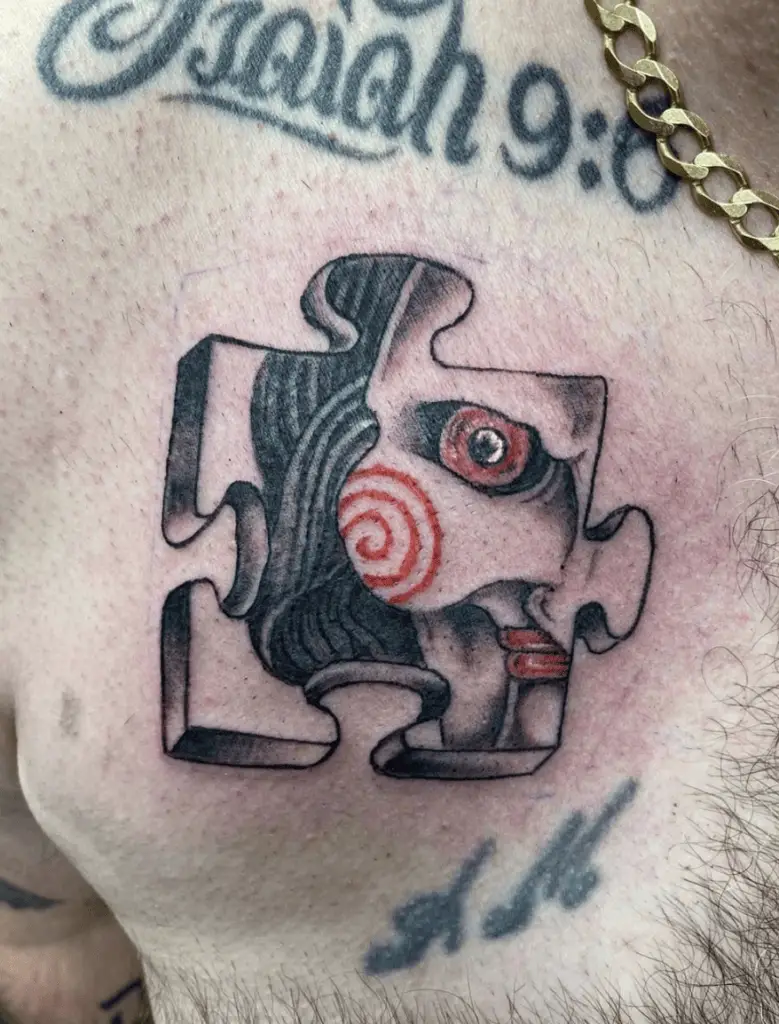 Jigsaw in a 3D Puzzle Piece Chest Tattoo