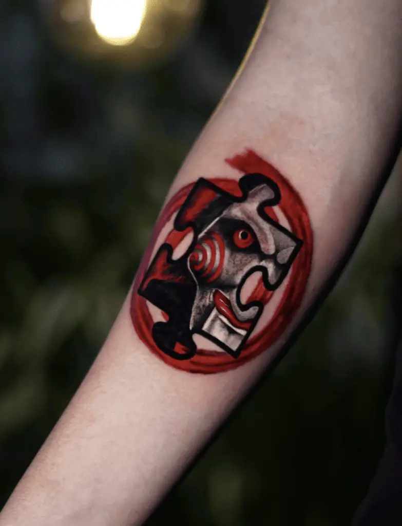 Jigsaw in a Puzzle Piece Arm Tattoo