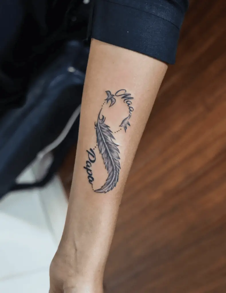 Maa and Papa Text With Feather Infinity Arm Tattoo
