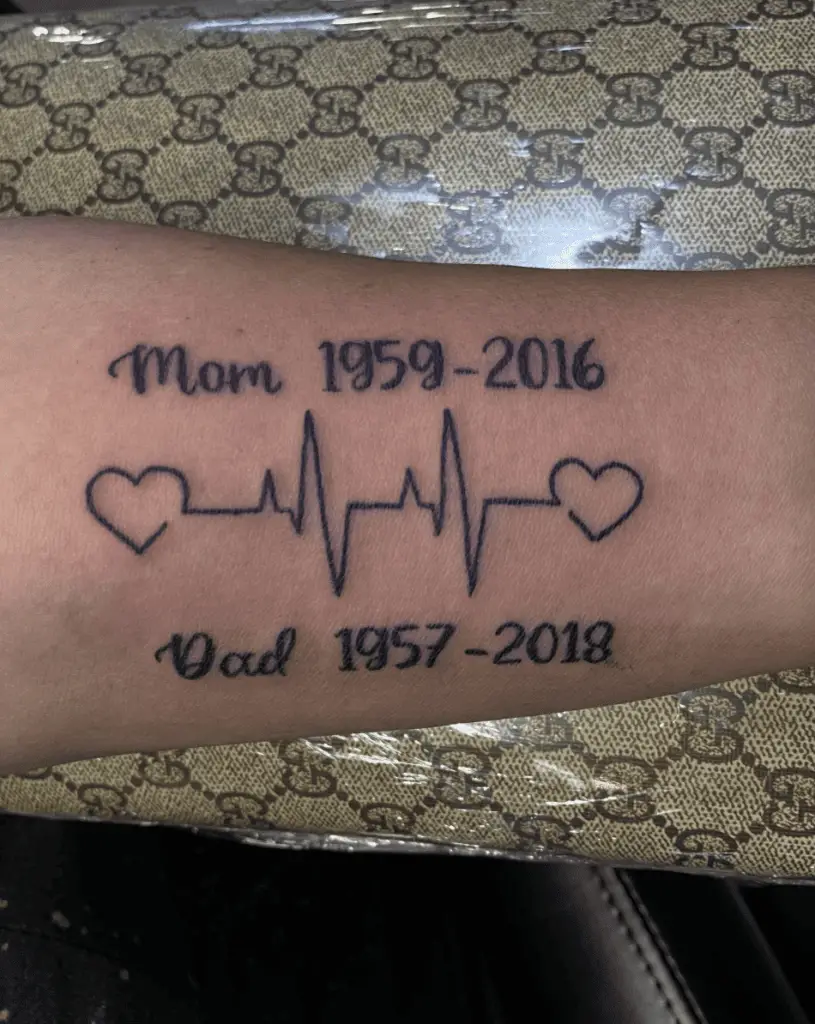 Memorial Date of Mom and Dad With Text and Heart Beat Pattern Arm Tattoo