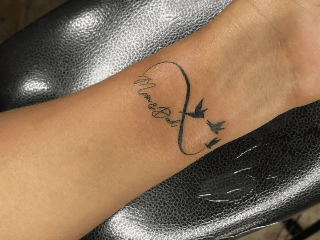 Minimalist Mom and Dad With Infinity and Birds Arm Tattoo