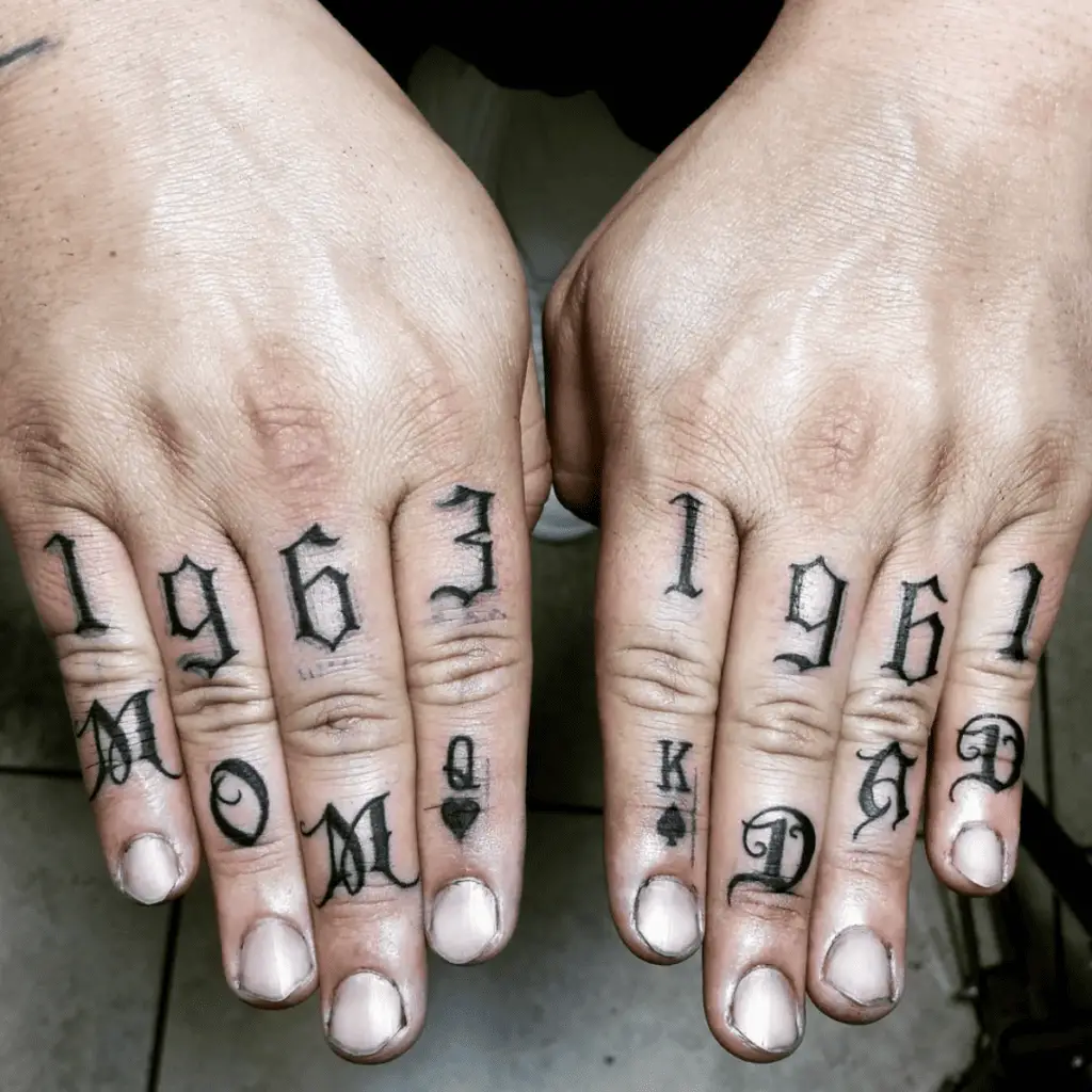 Mom and Dad Script Letters and Numbers With Card Symbols Fingers Tattoo