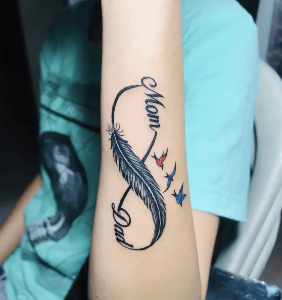 Mom and Dad With Infinity Feather and Colored Birds Arm Tattoo