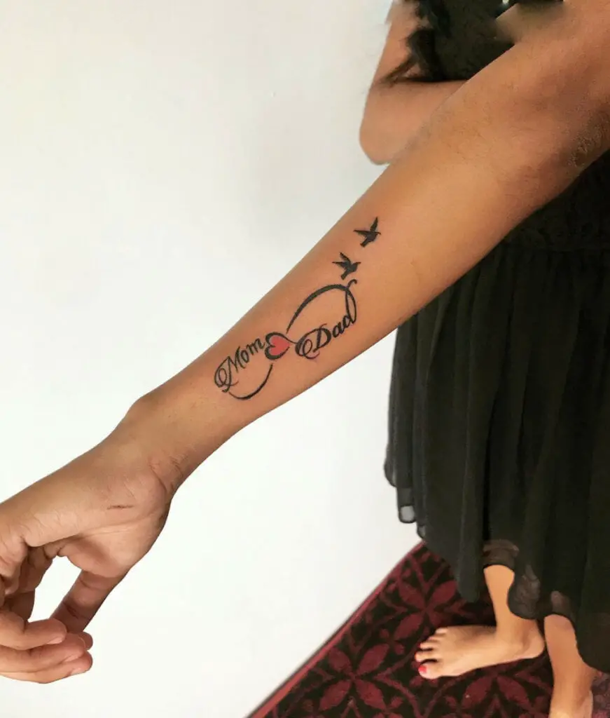 Mom and Dad With Infinity and Birds Arm Tattoo