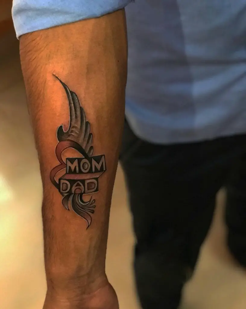 Mom and Dad With Steel Wing Heart Arm Tattoo