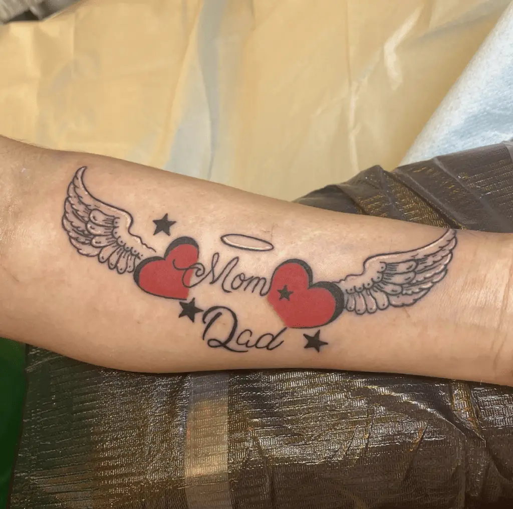 Mom and Dad With Two Heart Wings and Stars Arm Tattoo