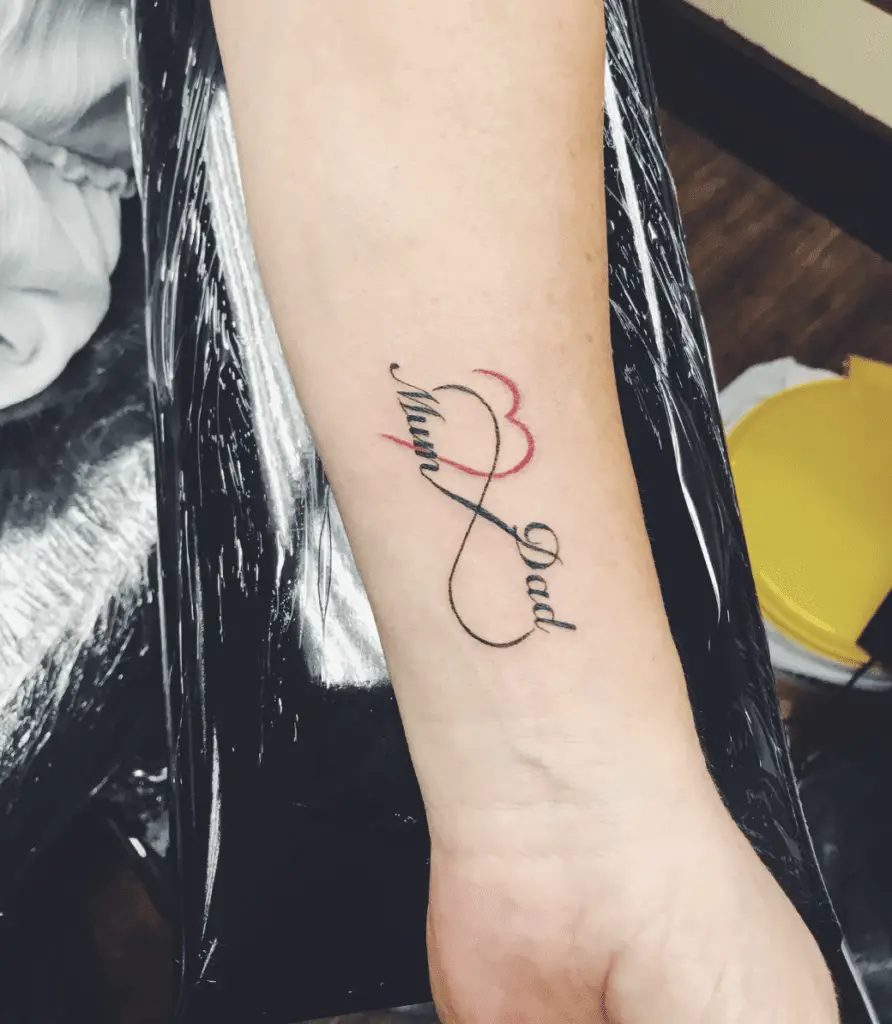Mom and Dad in Infinity Sign With Red Outline Heart Arm Tattoo