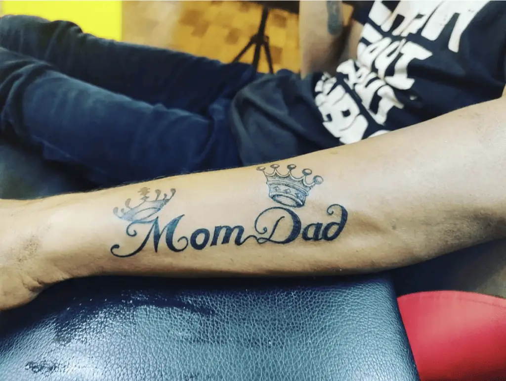 Mom and Dad with Crown Arm Tattoo