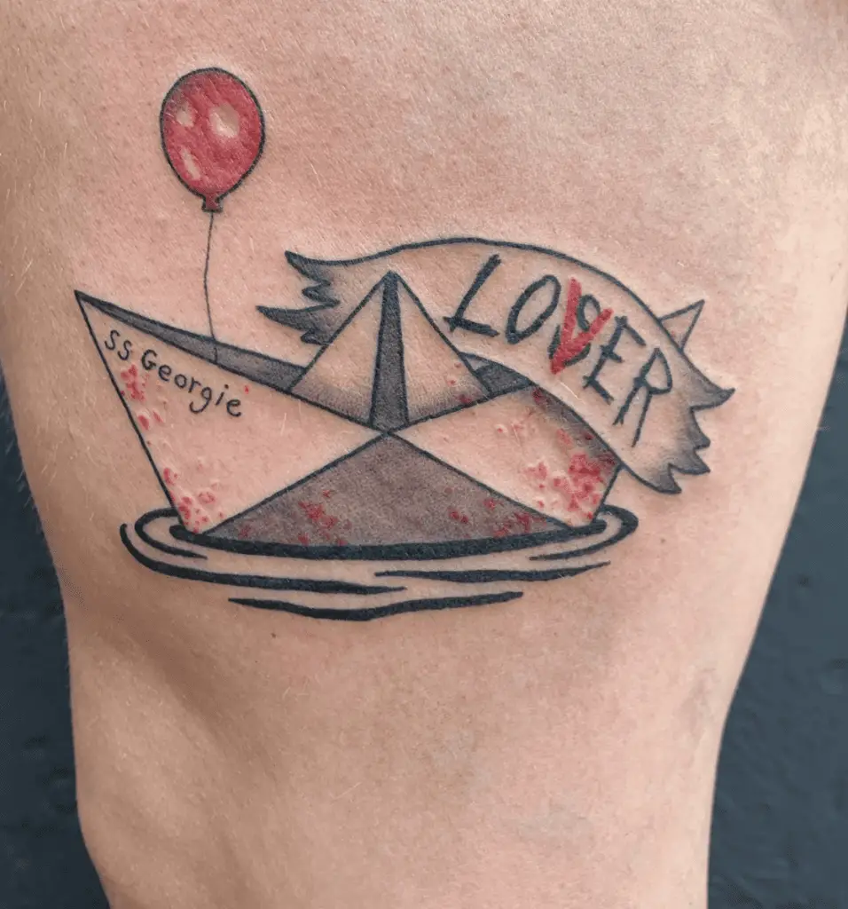 Paper Boat Stained With Blood With A Red Balloon And A Note Of Lover Instead Of A Loser Thigh Tattoo