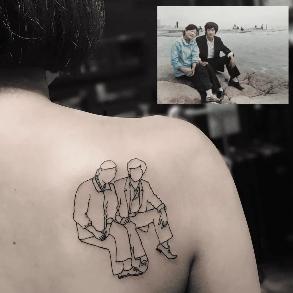 Photo Outline of Mom and Dad Shoulder Tattoo