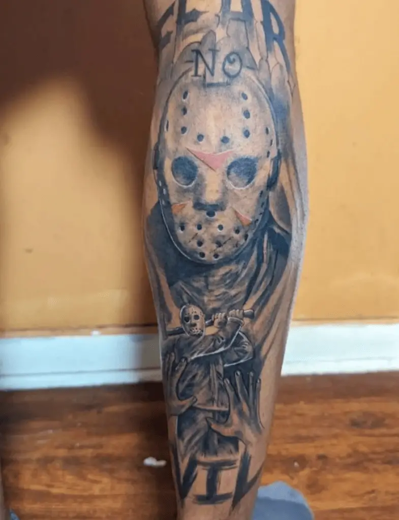 Portrait of Masked Man Leg Tattoo