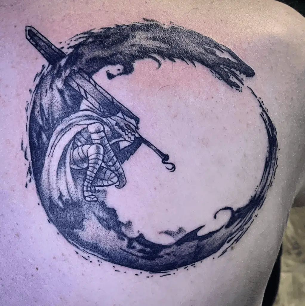 Resting Warrior inside a Circular Dragon Hips Tattoo