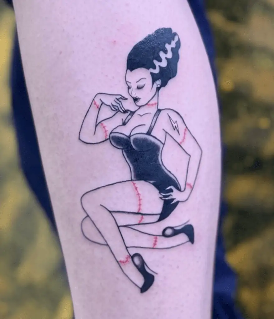 Sexy Woman Sitting Crossed Legs With Red Body Stitch Arm Tattoo