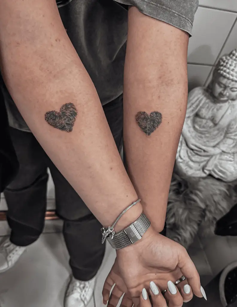Simple Fingerprint Heart Matching Arm Tattoo