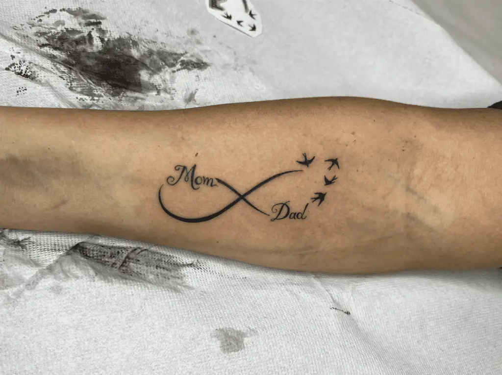 Simple Mom and Dad in Infinity Sign and Birds Arm Tattoo