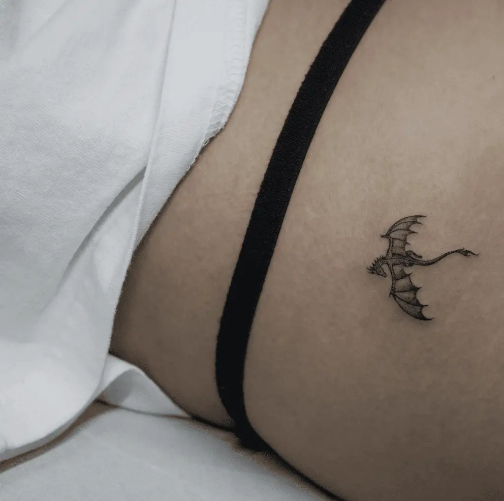 Tiny Dragon Flying Tattoo