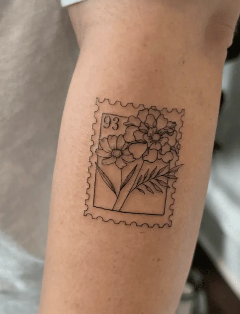 Two Flowers and Number in Stamp Tattoo