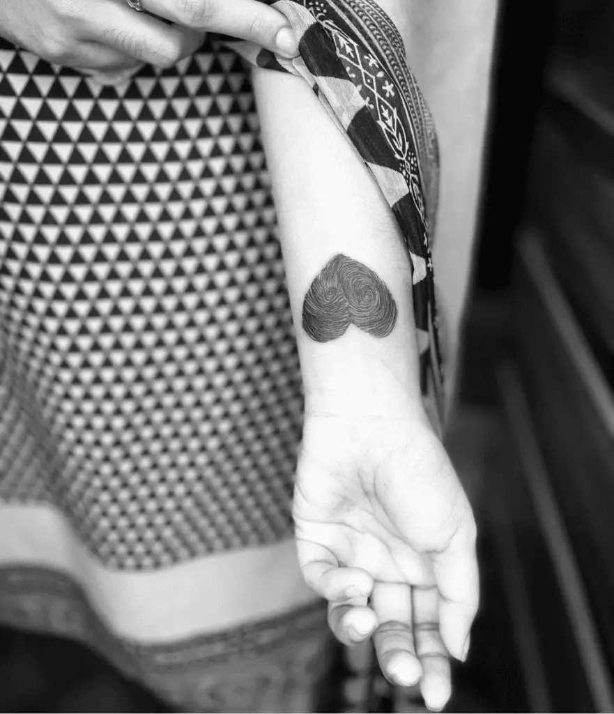 Upside Down Fingerprint Heart Arm Tattoo