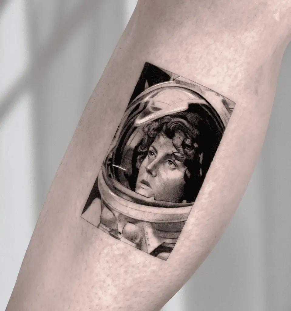 Woman Wearing an Astronaut Suit Arm Tattoo