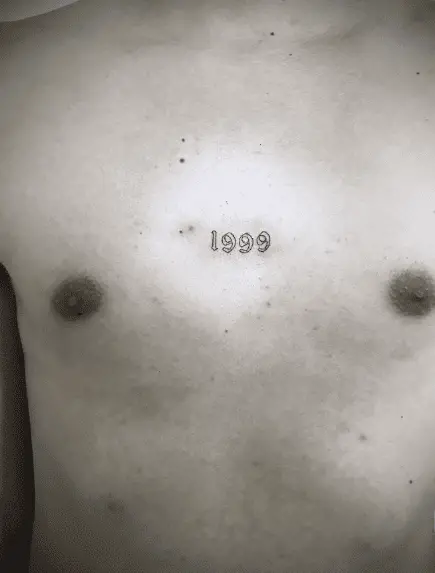 Tiny 1999 Chest Tattoo