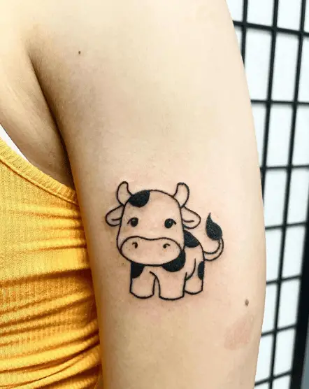 Cute Little Moo Cow Arm Tattoo