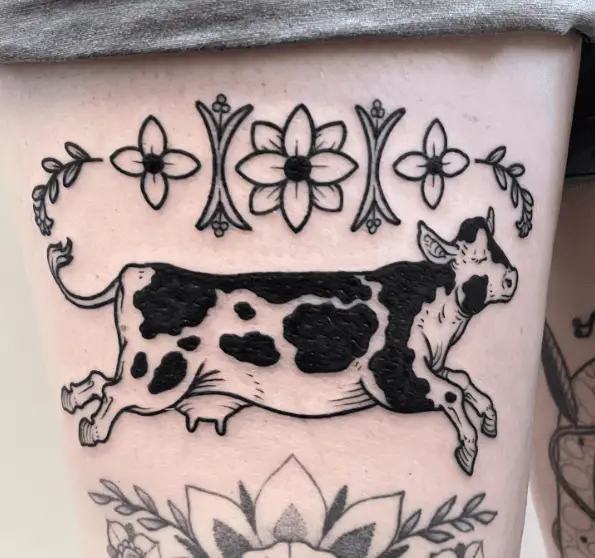 Black and White Cow with Flowers Tattoo