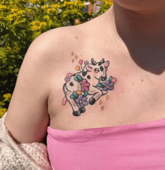 Black and White Cow with Colorful Florals Tattoo