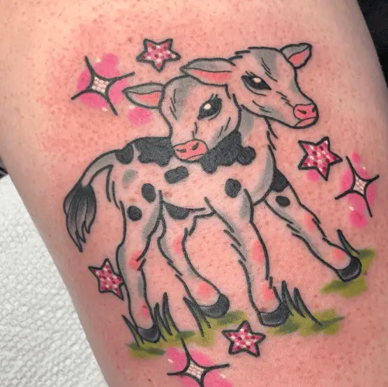 Blue Colored Two Headed Calf Tattoo with Sparks