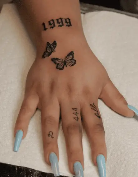 Tiny Two Butterflies with 1999 Tattoo