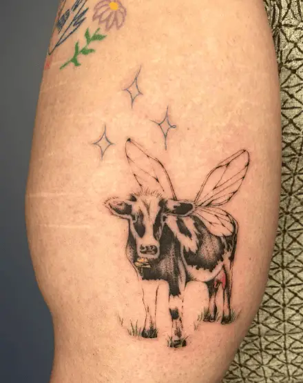 Black and White Winged Cow Tattoo