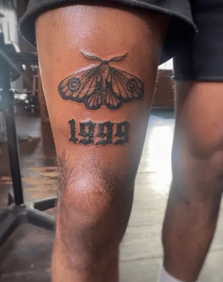 Moth and 1999 Year Thigh Tattoo