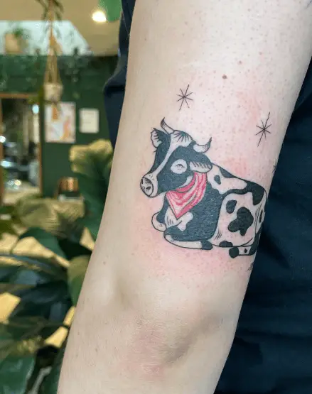 Cow with Red Scarf Arm Tattoo