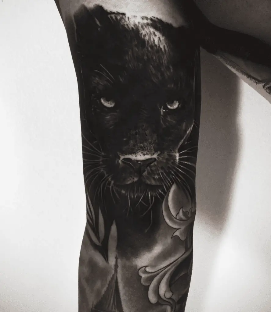 A Menacing Black Panther Arm Tattoo