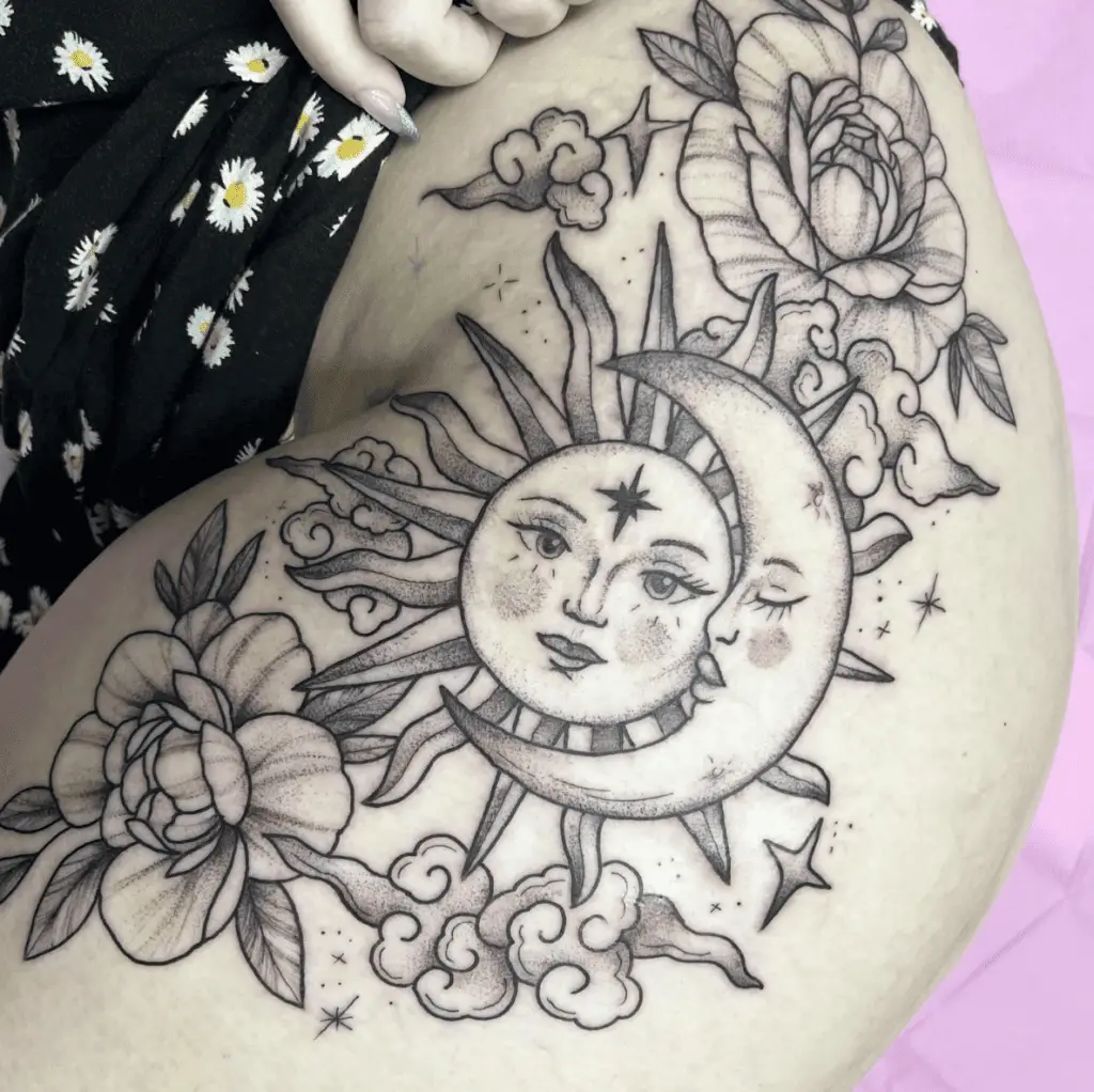 Beautiful Sun and Moon With Clouds and Flowers Shoulder Tattoo