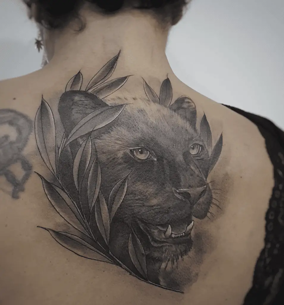 Black Angry Panther With Leaves Back Tattoo