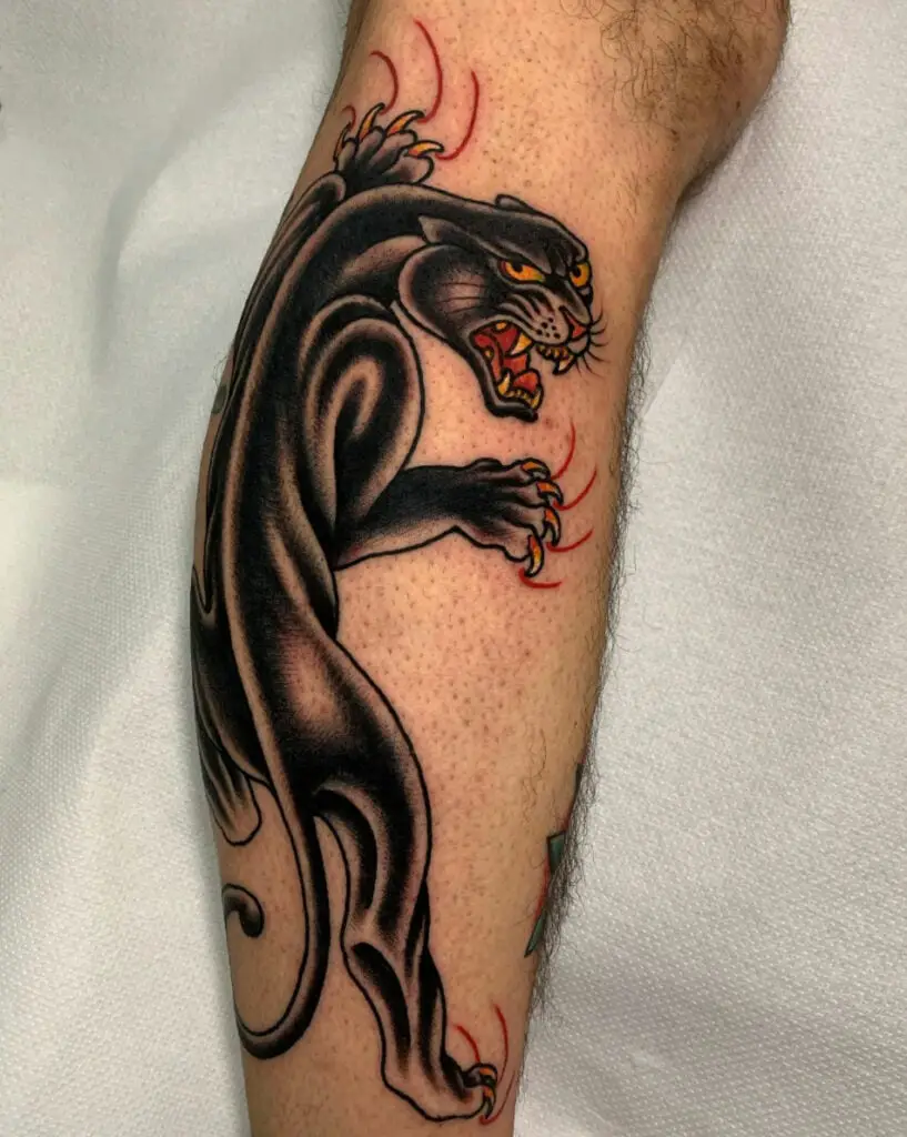 Black Angry Jaguar With Red Scratch Marks Leg Tattoo