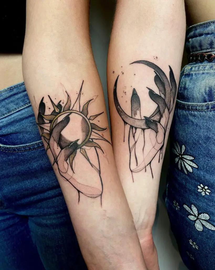 Black Bloody Hand Holding the Sun and Moon Matching Arm Tattoo