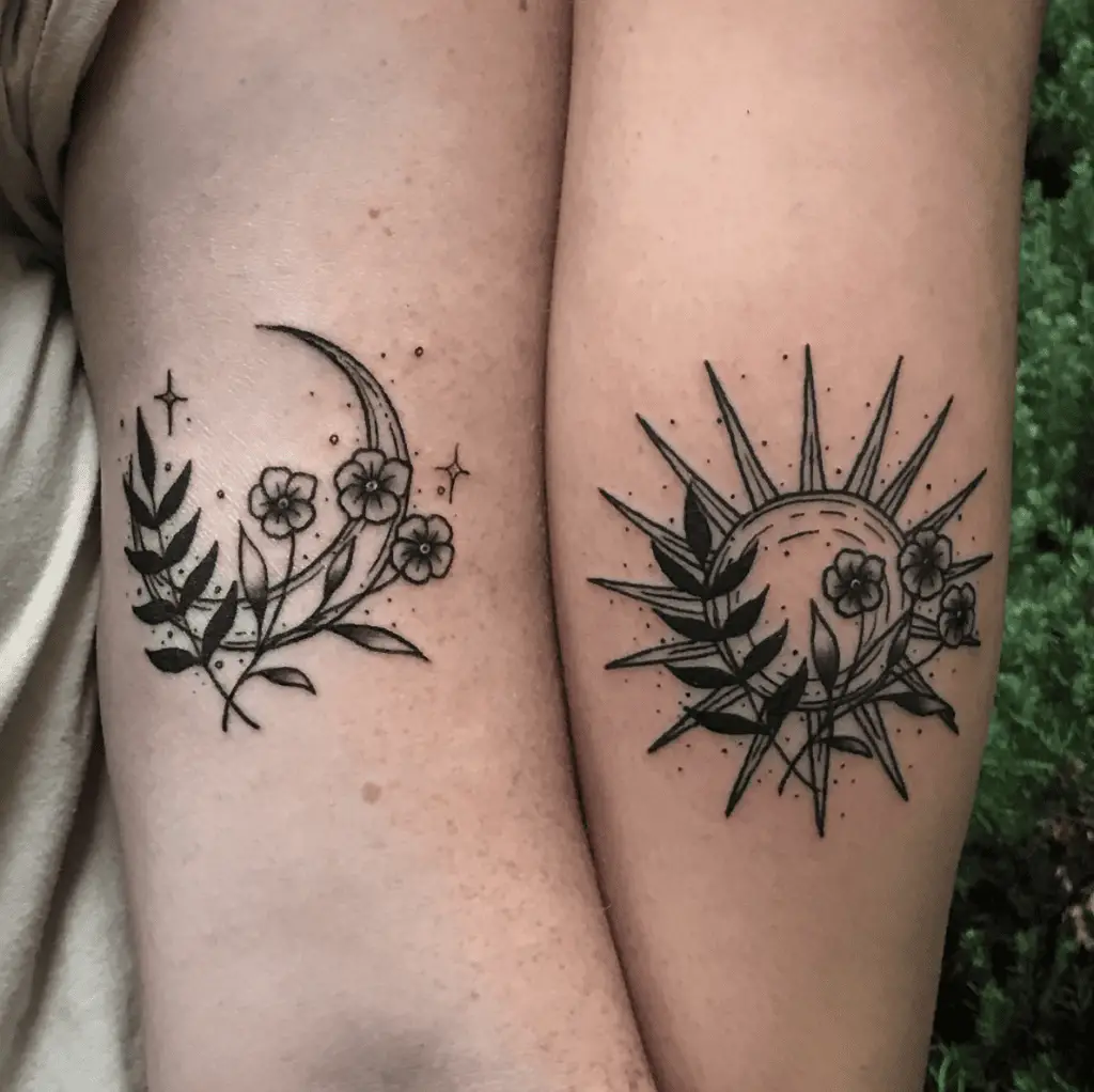 Black Detailed Floral Crescent Moon With Stars and Sun Arm Tattoo