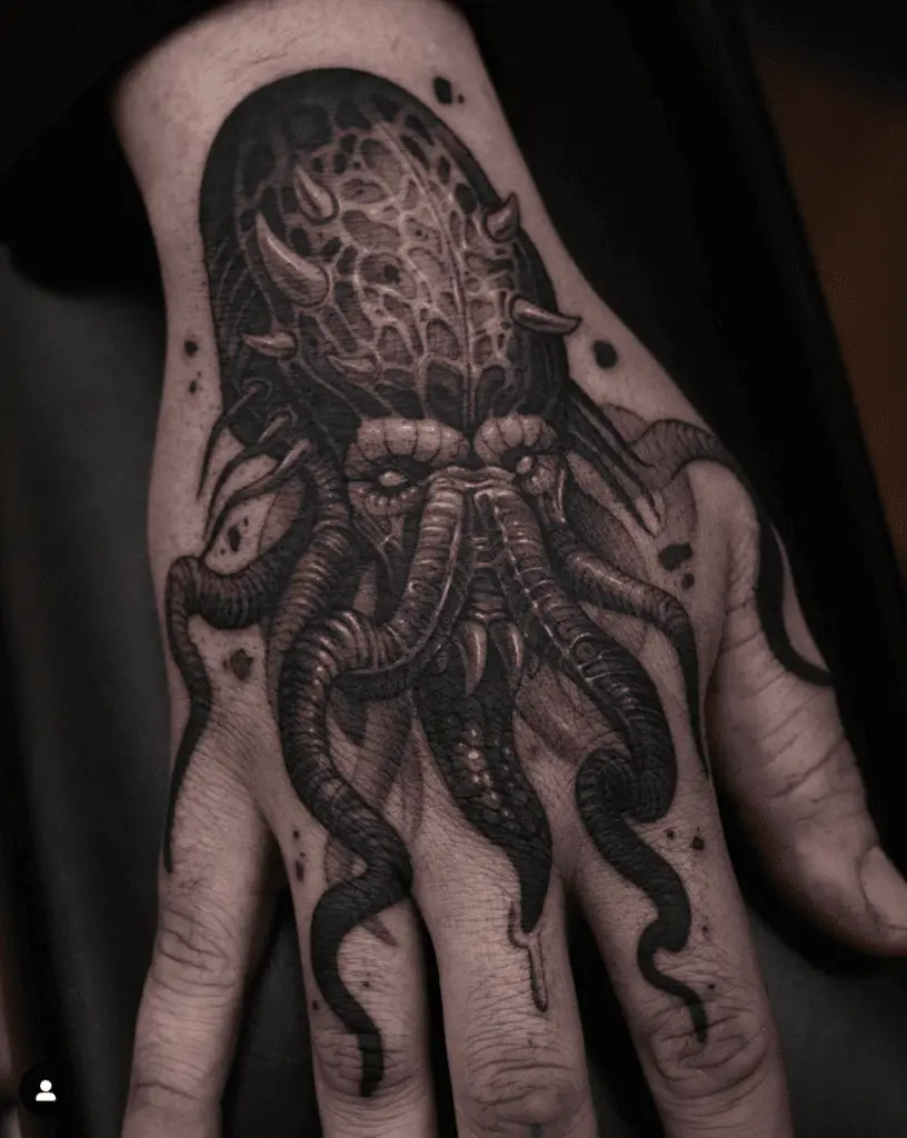 Black Detailed Kraken With Horns Hand Tattoo