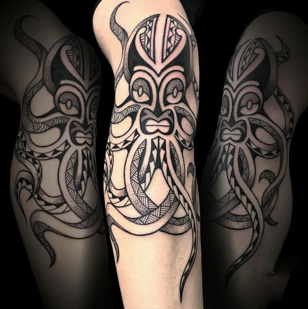 Black Ink Kraken With Tribal Pattern Print Leg Tattoo