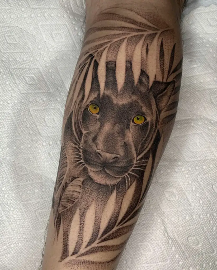 Black Panther With Leaves Leg Tattoo
