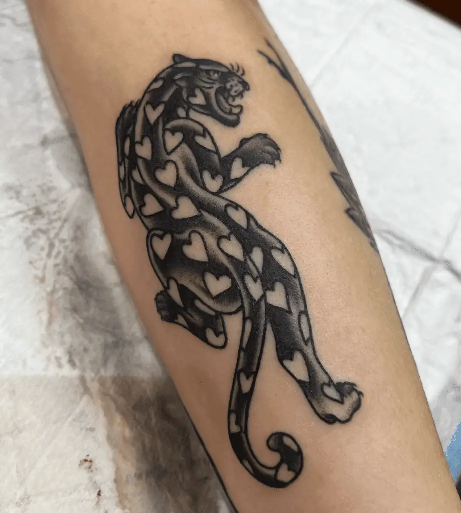 Black Panther With White Heart Print Arm Tattoo