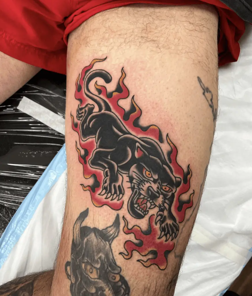 Black Panther Attacking on Fire Arm Tattoo