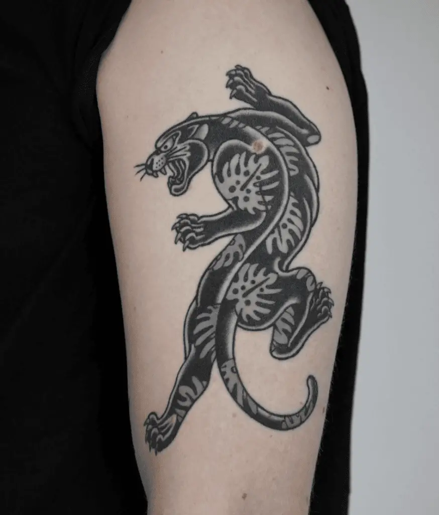 Black Panther Crawling With Leaf Patterned Body Upper Arm Tattoo