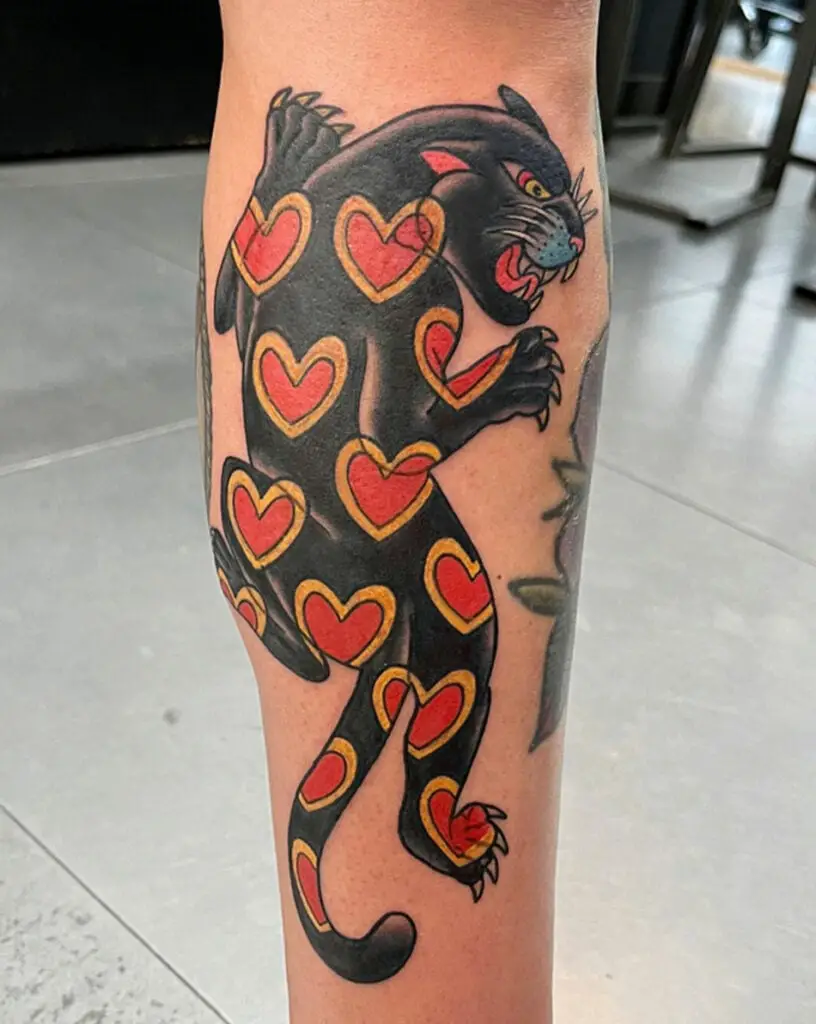 Black Panther With Yellow Red Heart Pattern Leg Tattoo