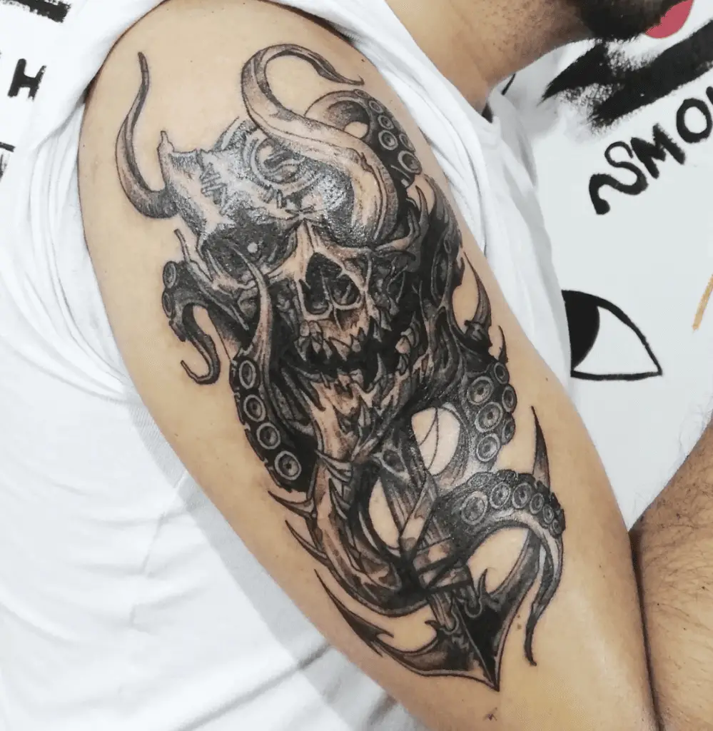 Black and Gray Scary Kraken Skull Upper Arm Tattoo