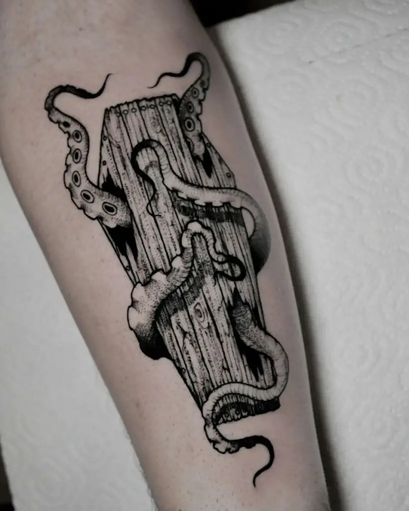 Black and Grey Kraken Inside the Damaged Wooden Coffin Arm Tattoo
