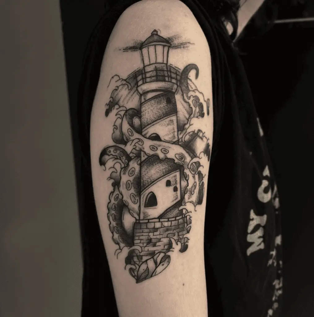 Black and Grey Kraken Tentacles Wrapped Around the Lighthouse Upper Arm Tattoo