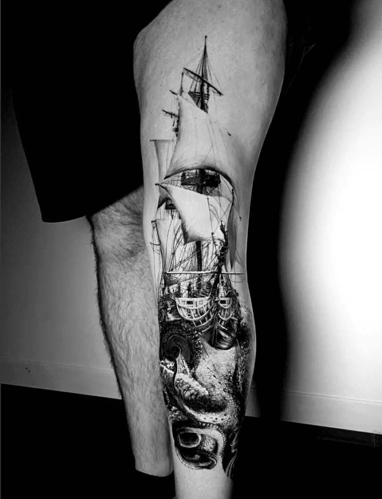 Black and Grey Realistic Kraken in Battle With a Ship Leg Tattoo