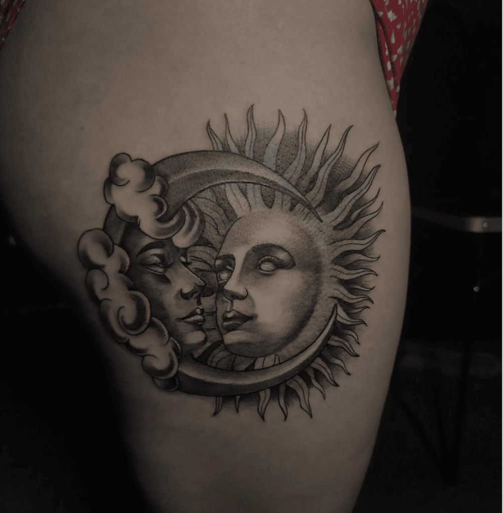 Black and Grey Realistic Sun and Moon Faces With Clouds Thigh Tattoo